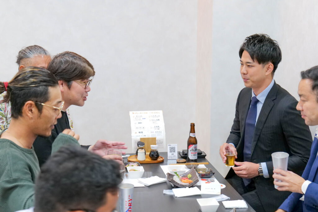 魚政 新店舗レセプションの様子(集合)」 loading=