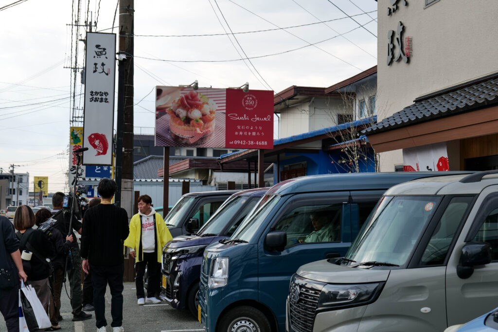 リポーターさんと店主のツーショット